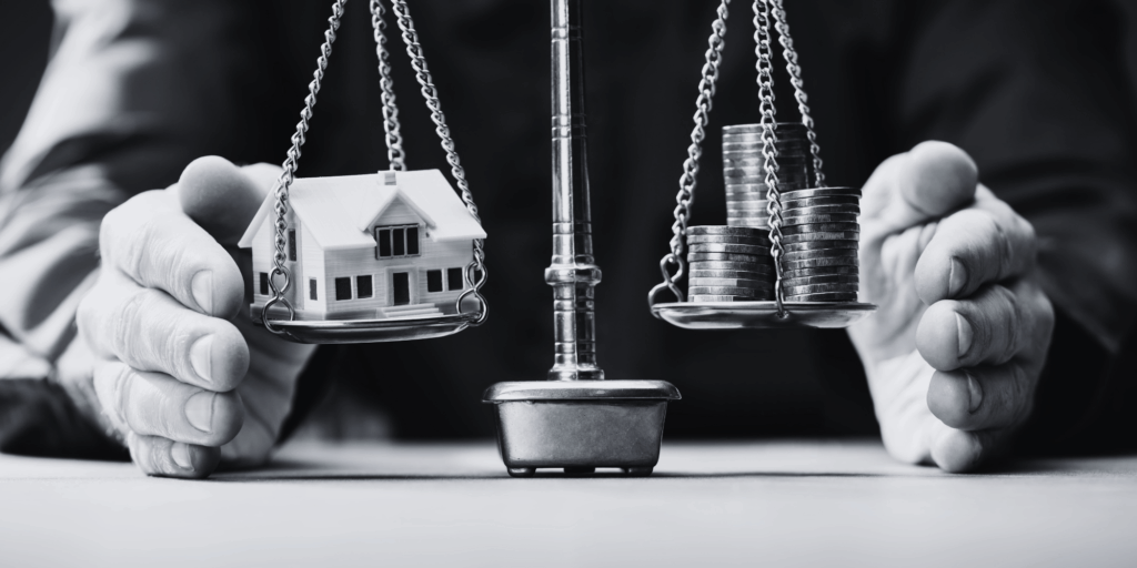 Image showing balance between house and funds in asset division during divorce.