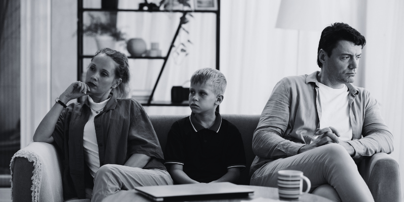 Couples going through a divorce, with their child in between