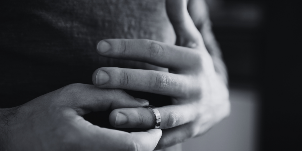 A woman pulling her wedding ring out of her hands.
How long does a divorce take in South Africa?